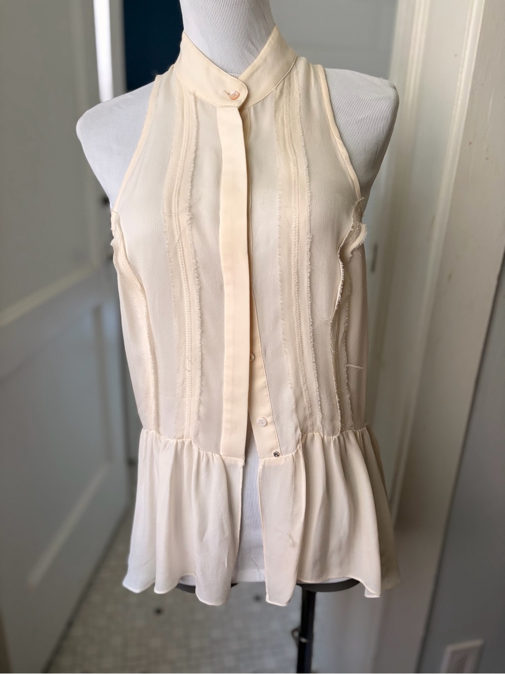Nicole Miller Offwhite Sleeveless Peplum Camisole